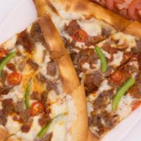Gyro Pide (Doner Pide) · Crispy crust of dough topped with gyro kebab, mozzarella cheese, tomato sauce, bell pepper a...