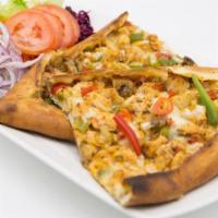 Chicken Pide · A thin crust topped with diced chicken, sliced tomatoes, bell pepper, mushroom, onion, mozza...
