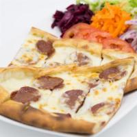 Soujuk Pide (Sucuklu Pide) · A thin crust topped with Turkish soujuk, (beef pepperoni) mozzarella cheese, bell pepper and...