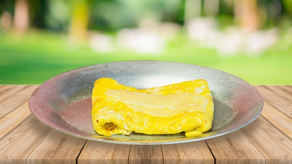 Omelet With Cheese · Three eggs with cheese.