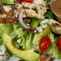 Green Cobb (16 Oz) · Romaine lettuce, boiled eggs, bacon, avocado, blue cheese, grape tomatoes and grilled chicke...