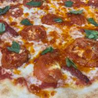 Very Tomato Pizza  · Large. Plum Tomato Sauce, Mozzarella Cheese, Sun Dried Tomato, Char Roasted Tomato drizzle w...