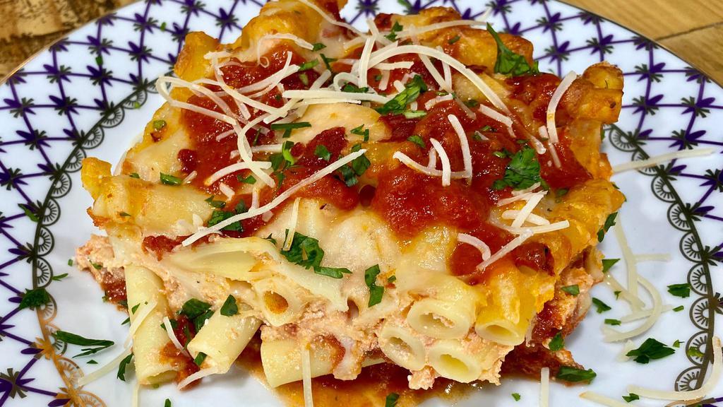 Baked Ziti Al Forno · ziti pasta, ricotta cheese, parmesan cheese, mozzarella cheese & tomato sauce