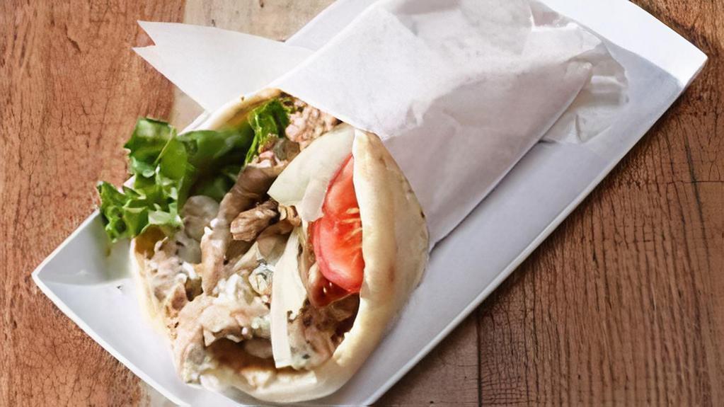Beef And Lamb Gyro Sandwich · Wrapped in gyro bread, served with lettuce, tomato, onion and tzatziki sauce.