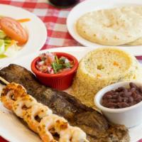 Carne Asada Con Camrones · Grilled Steak and Shrimps: With rice, Beans and pico de gallo.
Carne Asada Con Camarones: Ar...