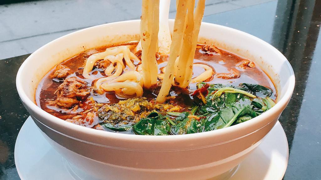 Spicy Beef Noodle Soup · Hot and spicy. Served with your choice of noodle.