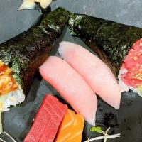 Sushi & Sashimi For 2 · Six pieces of sashimi (three tuna and three salmon) and three pieces of sushi (three yellowt...