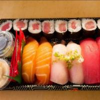Sushi Entrées · Six pieces of sushi (two salmon, two tuna, and two yellowtail) on a tuna or California roll.