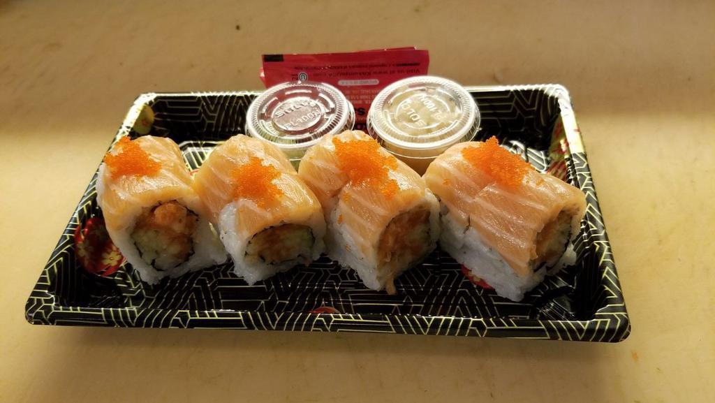 Salmon Dream · Crunchy spicy salmon and cucumber inside with salmon.