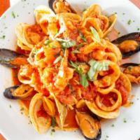 Seafood Fra Diavolo · Spicy. Clams, mussels, shrimp, calamari & scungilli served over choice of pasta in a spicy m...