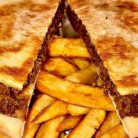 Hawawshi With French Fries. · Pita bread stuffed with ground beef mixed with mozzarella cheese and special vegetable blend...