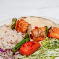 Salmon Shish Kebab · Salmon shish with vegetables
comes with rice and salad.