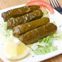 Grape Leaves · Homemade. Grape leaves delicately filled with rice and herbs.