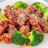 Sesame Chicken · Chunks of chicken batter-dipped in special sauce with sesame seeds and broccoli. hot and spi...