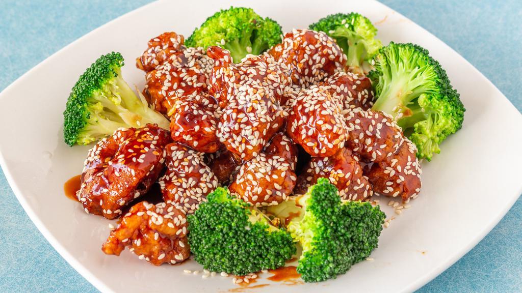 Sesame Chicken · Chunks of chicken batter-dipped in special sauce with sesame seeds and broccoli. hot and spicy.