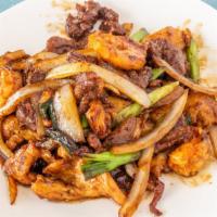 Hunan Triple Delight · Spicy. Roast pork, beef & chicken.