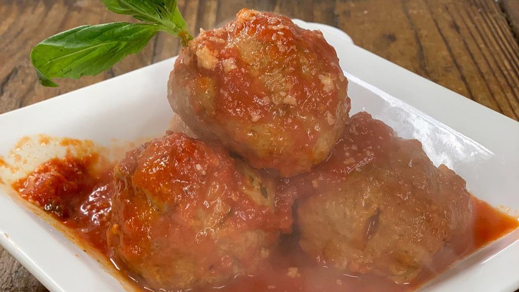 Side Of Meatballs (4) · Beef and pork meatballs in tomato sauce.