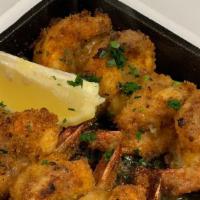 Shrimp Oreganata (8) · Shrimp baked and topped with garlic, and breadcrumbs.