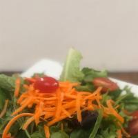 Mesclun Salad · Mixed greens, tomatoes, and carrots, served with homemade vinaigrette.