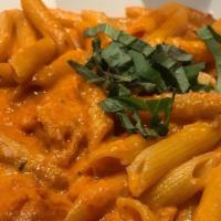 Penne Vodka · Penne pasta with vodka, cream, and tomato sauce.