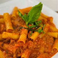 Rigatoni Bolognese · Rigatoni topped with our homemade bolognese meat sauce.
