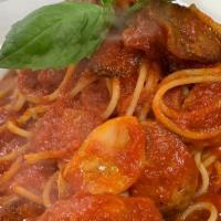Spaghetti With Meatballs & Sausage · 3 large beef and pork meatballs with sausage, served over spaghetti and tomato sauce.