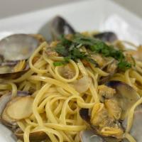 Linguini With Clam Sauce · Baby clams sauteed in olive oil, garlic, and white wine.