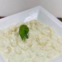 Gnocchi Gorgonzola · Potato filled pasta served with Gorgonzola cream sauce.