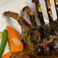 Lamb Chops · New Zealand lamb chops grilled with fresh herbs.