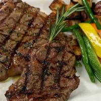 Rib Eye Steak 12 Oz. · Steak grilled with fresh herbs.