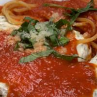 Eggplant Rollatini · Sliced eggplant rolled and stuffed with ricotta, topped with fresh mozzarella.