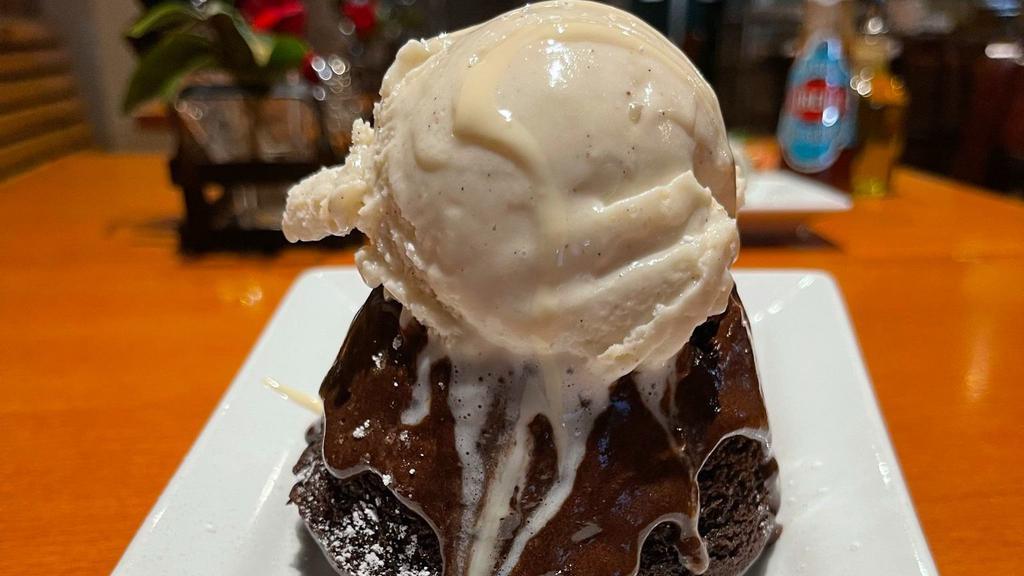 Chocolate Lava Cake · Soufflé chocolate cake w/ oozing chocolate topped w/ Vanilla gelato.
(Customer must microwave the cake for 45-75 seconds, until the chocolate oozes out then add ice cream)