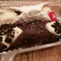 Chocolate Dipped Italian Cannoli · Sweet ricotta cream in chocolate dipped wafer shell.