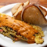 Poblano Chipotle Omelet · Sauteed in a mix of onions, tomatoes, and peppers, served with breakfast potatoes.