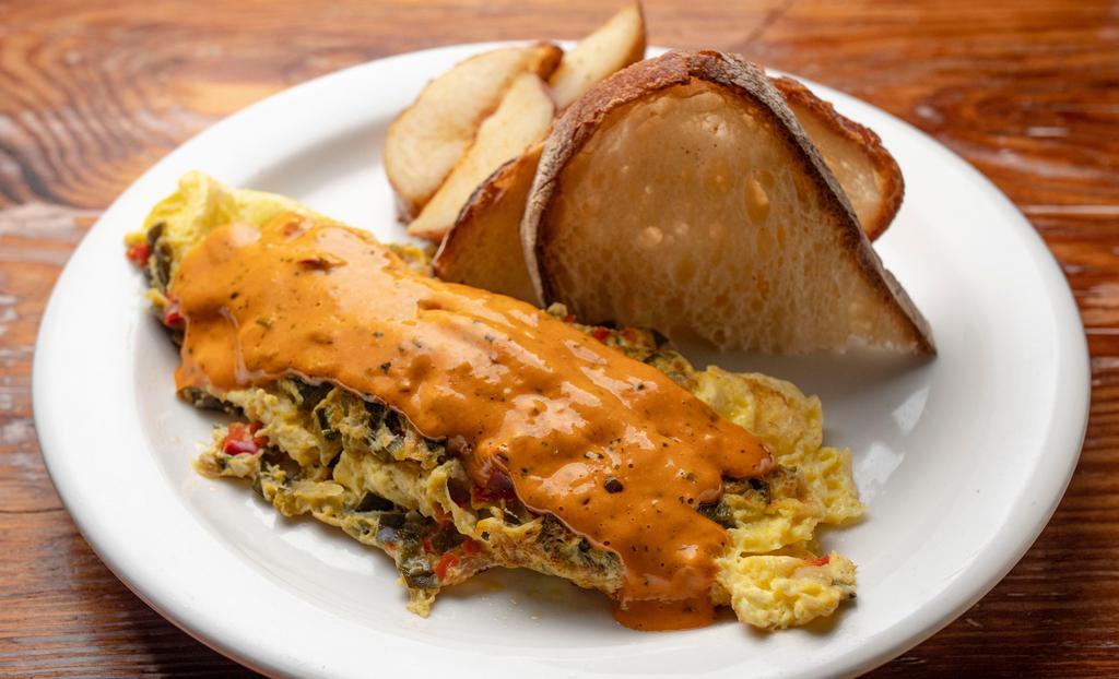 Poblano Chipotle Omelet · Sauteed in a mix of onions, tomatoes, and peppers, served with breakfast potatoes.