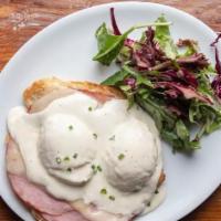 Croque Madame · Sliced Turkey ham, gruyere cheese, and soft poached eggs served on a fresh croissant dressed...
