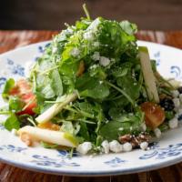 Baby Arugula Salad · Baby arugula, sweet dried cranberries, creamy goat cheese, topped with Granny Smith apples, ...