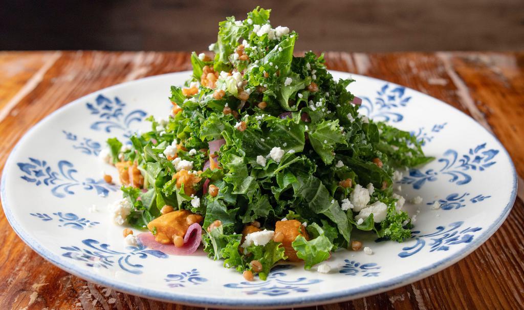 Organic Farro & Roasted Sweet Potato Salad · Fresh kale leaves, cashews, fresh mint, and home-made pickled onions topped with feta cheese and dressed in lemon juice.