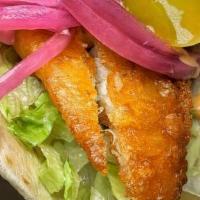 Fish Tacos (2) · crisp battered cod, shredded lettuce, pickled onions, jalapeños, spicy mayo on warm flour to...