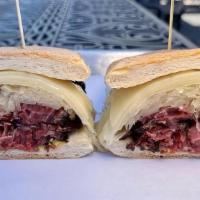 Pastrami Sandwich · overstuffed sandwich with 1/2 lb of meat. beef brisket house-brined for two weeks then smoke...