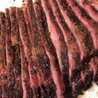 Beef Brisket - 1/2 Lb · 1/2 lb of sliced prime beef, smoked for over 12 hours with oak, hickory and maple