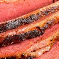 Pastrami - 1/2 Lb · 1/2 lb of sliced house-brined prime beef, smoked for over 12 hours with oak, hickory and map...
