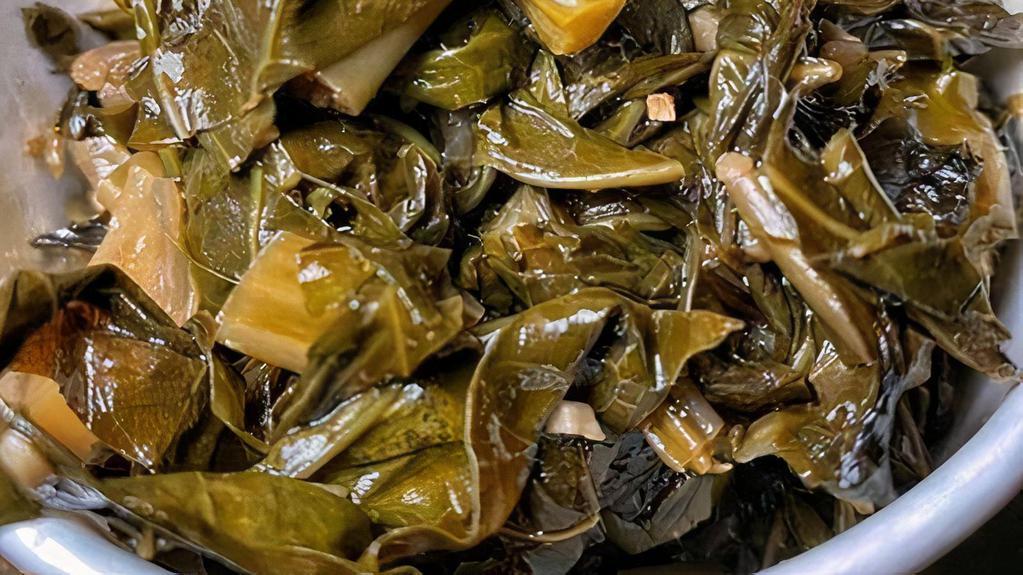 Collard Greens · wholesome collard greens, chopped and sautéed with house spices, garlic and pork fat