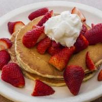 Fruit Pancakes · Made with state line batter, choice of fruit topping.
