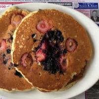 Fruit Pancakes · Filled with Choice of Strawberry Blueberry, Cherry or Apple filling, Topped with Powdered Su...