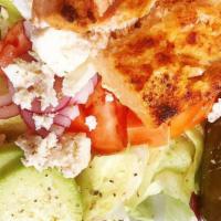Greek Salad · Crisp Lettuce, Tomatoes, Cucumbers, Onions, Green Peppers, Olives and Anchovies in Our Athen...