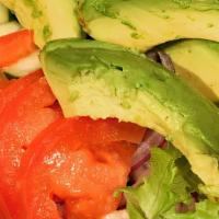 Green Salad · Mixed greens, avocado, tomatoes, cucumbers & red onions