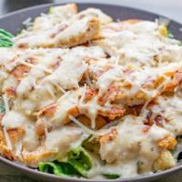 Grilled Chicken Caesar Salad · Green salad with caesar dressing and cheese.