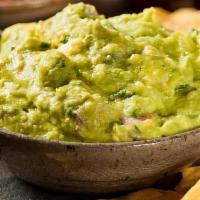 Guacamole · Fresh avocados blended with tomatoes and spices
