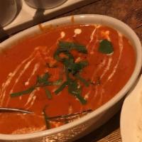 Paneer Makhani · Cubes of homemade cottage cheese cooked in a tomato based gravy, finished with butter and to...